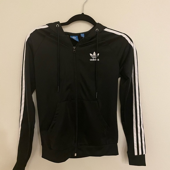 Adidas jacket - classic look with stripes down arms and a hood. Very gently worn - Picture 2 of 4